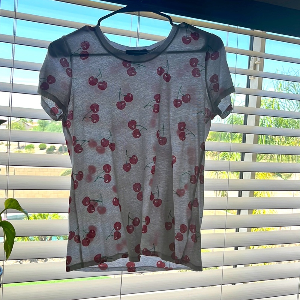 A t-shirt with cherrys on it! Good for summer, very thin material.